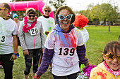 Portrait smiling, runner in silly sunglasses