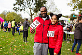 Portrait father and daughter runners