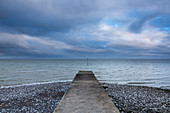 Jetty with stormy ocean view, Silloth, Cumbria, UK