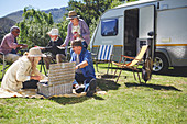 Active senior friends enjoying picnic