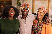 Family wearing Christmas costume goggles