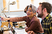 Business people meeting, working at computer in office