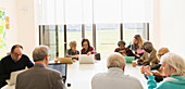 Senior business people in conference room meeting