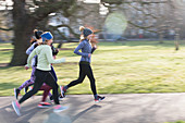 Female runners running in park