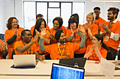 Enthusiastic hackers coding at hackathon