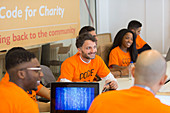 Hackers coding for charity at hackathon