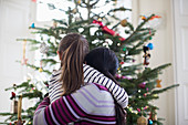 Mother and daughter hugging at Christmas