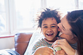 Portrait happy, affectionate mother and daughter