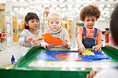 Kids playing at interactive exhibit