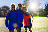 Portrait smiling, girl soccer players
