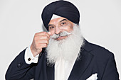 Senior man with white beard wearing turban
