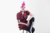 Young woman with pink mohawk