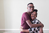 Portrait affectionate teenage brother and sister hugging