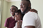 Portrait affectionate mother and teenage sons