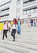 students leaving school building