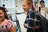 Happy, laughing school student