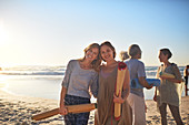 Portrait mother and daughter with yoga mats