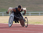 Determined paraplegic athlete during wheelchair race