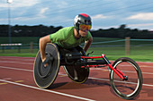 Determined paraplegic athlete in wheelchair race