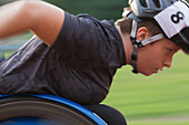 Determined paraplegic athlete during wheelchair race