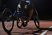 Tired paraplegic athlete resting after wheelchair race