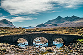 Bridge over craggy river, Isle of Skye, Scotland