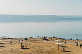 Scenic view beach and blue lake, Dead Sea, Jordan