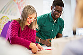 Fashion designers working in studio