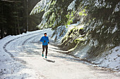 Man jogging in snow