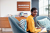 Portrait businesswoman working in office