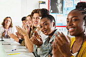 High school students clapping in debate class