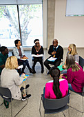 People talking in support group meeting circle