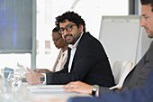 Portrait businessman in conference room meeting