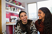 Portrait laughing teenage girl friends