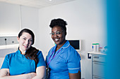 Portrait female nurses in hospital room