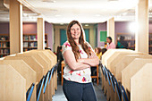 Portrait female teacher in library