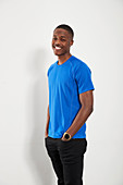 Portrait happy young man in blue t-shirt