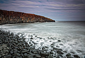 Rocks on remote ocean beach Cullernose Point Craster