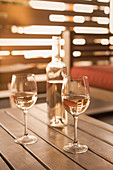 Rose wine on wooden patio table