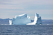 Majestic iceberg on blue Atlantic Ocean Greenland