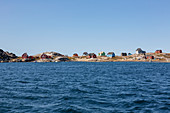 Multicolour houses on remote ocean coast