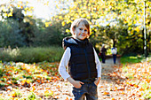 Portrait boy in autumn park