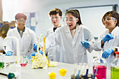 Students conducting exploding foam scientific experiment