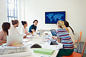 Designers brainstorming in conference room meeting