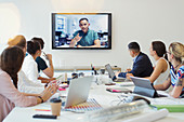 Designers video conferencing with colleague