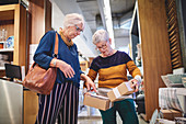 Senior women shopping in home goods store