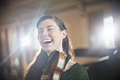 Violinist laughing