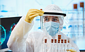 Female scientist researching coronavirus vaccine