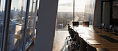 Sunny empty modern conference room with city view