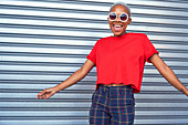 Portrait carefree young woman wearing sunglasses